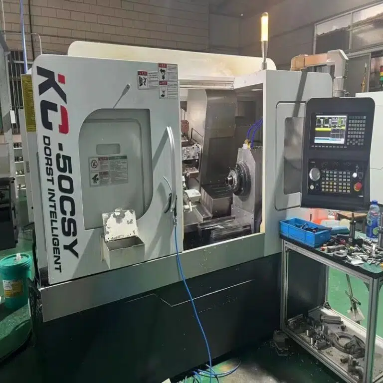 Máquina de torneado y fresado de doble husillo